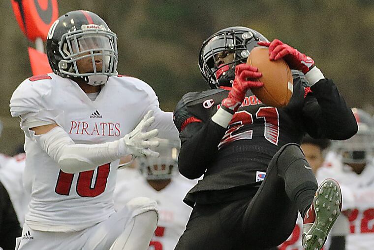 Haddonfield’s Davis Smith intercepts pass intended for Cinnaminson’s John Meekins.