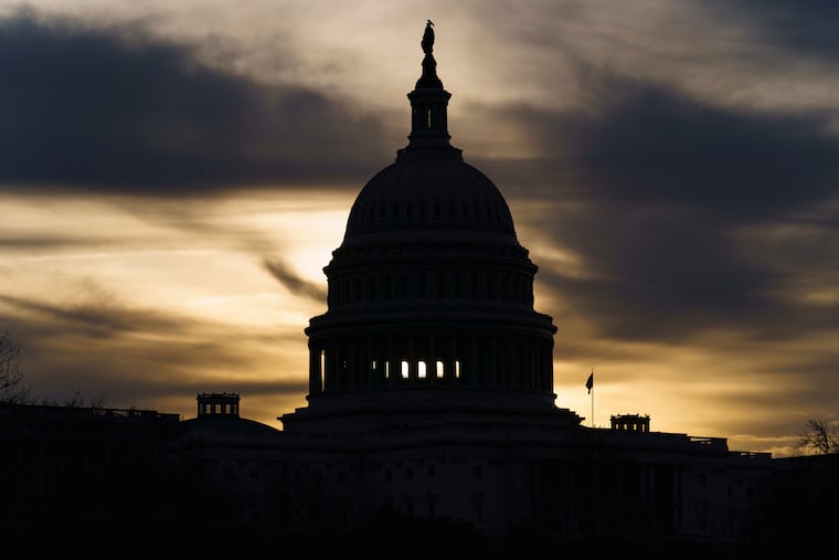 The Capitol is seen in Washington, early Friday, after President Joe Biden said he was unable to come to an agreement with Sen. Joe Manchin (D., W.Va.), a centrist Democrat vital to the fate of the Democrats' expansive social and environment bill.