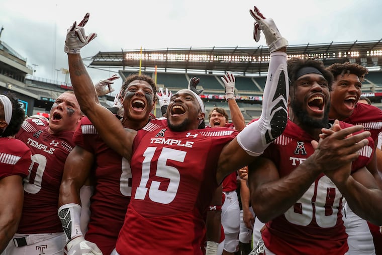 Temple football team celebrates with their fans after defeating No. 21 Maryland, 20-17, at Lincoln Financial Field in Philadelphia on Saturday, Sept. 14, 2019. The Owls are 2-0 to start the season.