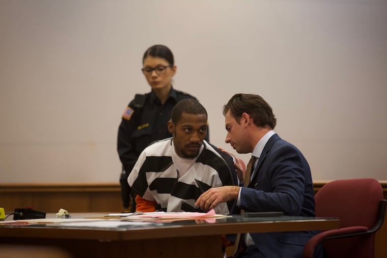 Defendant Vance Golden, 26, of Pleasantville, speaks with his attorney Jake Bayak at a court hearing on the Pleasantville football shooting.