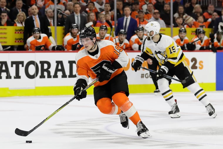 Flyers center Nolan Patrick, shown skating against the Pittsburgh Penguins, was unable to start training camp Friday.