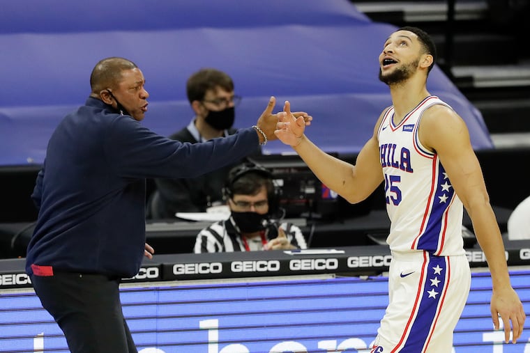 Sixers guard Ben Simmons and Head Coach Doc Rivers question a foul committed by Simmons during the second quarter against the Charlotte Hornets on Jan. 2 in Philadelphia.