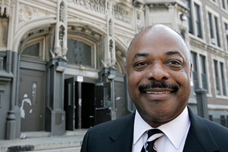 Jerry Jordan, president, Philadelphia Federation of Teachers, says teacher morale is very low. Behind him is West Philly High School. (Akira Suwa / Staff)