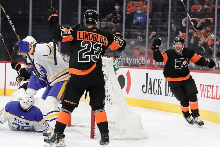 Flyers rookie Tanner Laczynski (right) celebrating Oskar Lindblom’s goal against Buffalo on April 11. Laczynski had hip surgery Monday and will miss the rest of the season.