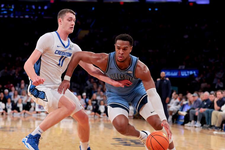 One key returnee for Villanova: big man Eric Dixon, driving against Creighton's Ryan Kalkbrenner during the Big East Tournament in March.