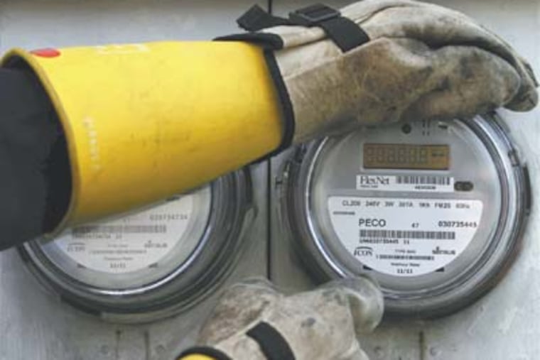 An upgraded meter being installed in Bristol. PECO began installing the first generation of 600,000 new-generation electric meters. They give customers more detailed information about their energy use. MICHAEL S. WIRTZ / Staff Photographer