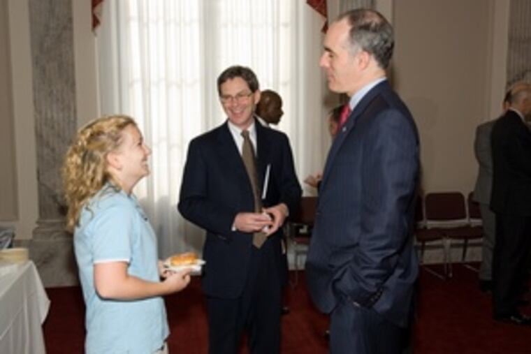Sen. Bob Casey (right) spends times with constituents Jessica Tramaglini of Penn State and Wayne Kenefick of Graymont Ltd.