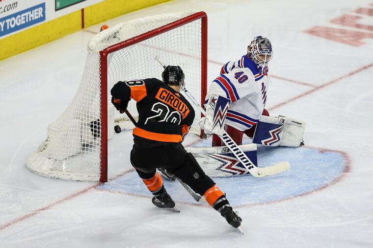 What the Flyers wouldn't give to see a picture like this in Toronto: Claude Giroux scoring a goal. He has scored once in his last 23 postseason games.