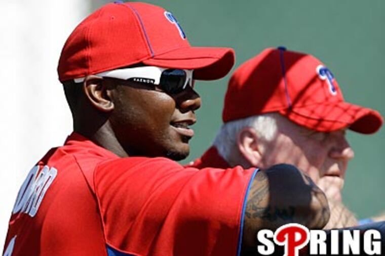 Ryan Howard will be in a walking boot for at least a week. (Matt Slocum/AP)