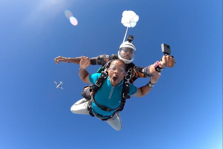 Will Smith (foreground) skydives in the first episode of his new Facebook Watch series, "Will Smith's Bucket List."