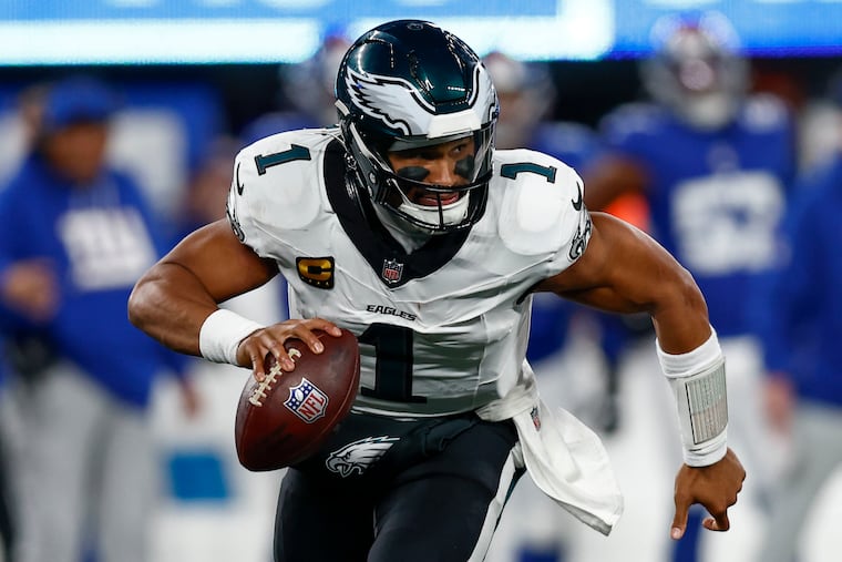 Jalen Hurts scrambles in the third quarter against the Giants on Oct. 9. The Eagles will travel to U.S. Bank Stadium on Sunday to face the Vikings.