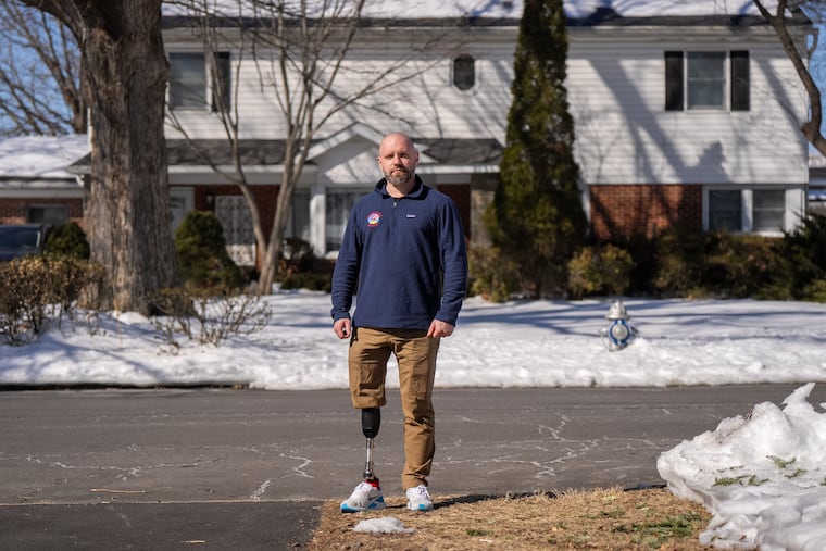 Ilia Haiduk is photographed outside a community-living home where veterans of the war in Ukraine support each other through their medical journeys, in Philadelphia, Feb. 13, 2026.