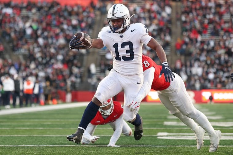 Kaytron Allen (13) scores a rushing touchdown against Rutgers on Nov. 29.