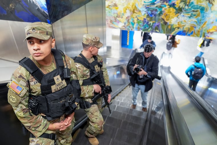 A couple of heavily armed New York National Guard members patrol Grand Central Terminal, Thursday, March 7, 2024, in New York City. Brian Pollitt argues that Pennsylvania should also deploy the National Guard to Philadelphia as a deterrent to violence.