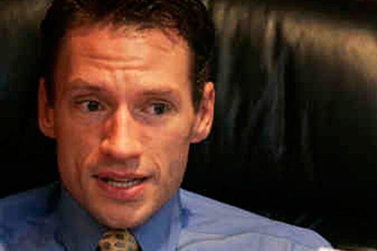 D. Scott Perrine, who had fled from house arrest on March 25 after cutting off an electronic ankle bracelet, was arrested in Arlington, Va.