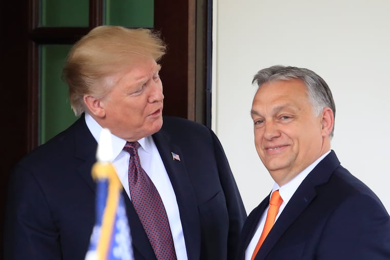 Then-President Donald Trump welcomes Hungarian Prime Minister Viktor Orbán to the White House in 2019. The GOP presidential candidate has praised Orbán as a “great leader” and “strong man,” continuing his love affair with autocrats, writes Trudy Rubin.