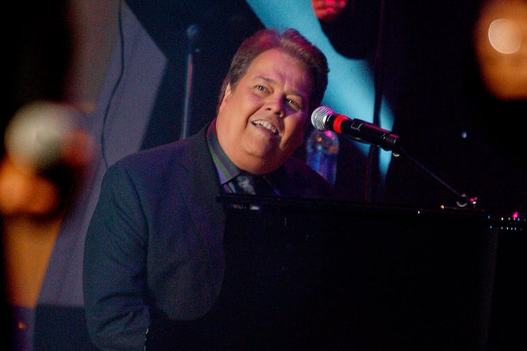 Alan Osmond performs during a taping of the Osmonds' 50th anniversary show in Las Vegas on Aug. 14, 2007.