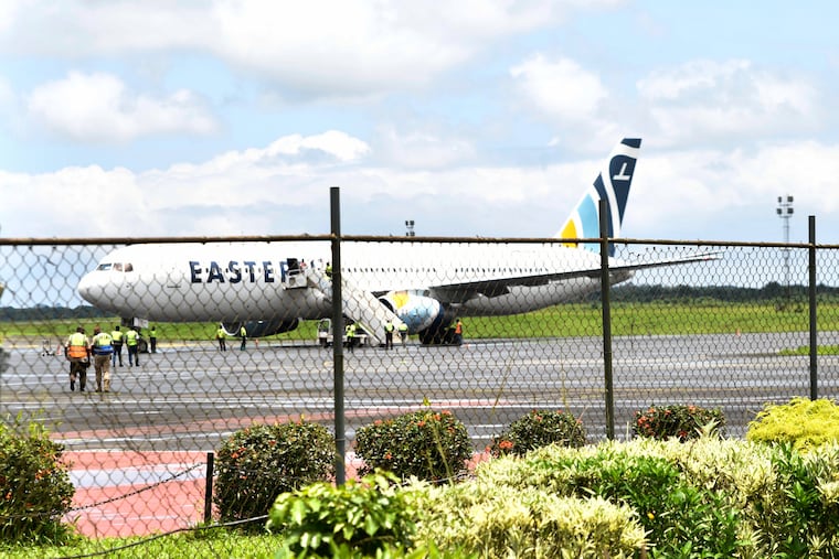 A plane carrying the deportees from the United States arrives at the Roberts International Airport outside of Monrovia, Liberia, Thursday, Aug. 20, 2026.