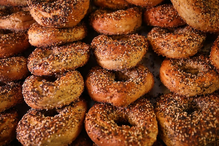 A tray of "everything" bagels cooling inside the Fishtown flagship of Philly Style Bagels, at 1451 E. Columbia Ave.