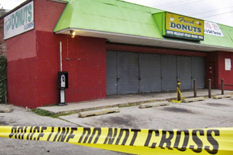 The site of the homicide: Fresh Donuts and Laundry Full & Self Service, at North 15th Street at Wyoming Avenue. (Alejandro A. Alvarez/Staff Photographer)