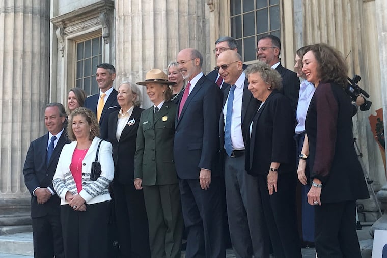 Independence National Historical Park Superintendent Cynthia McLeod, Pennsylvania Gov. Tom Wolf, Indepdence Historical Trust executive director Tom Caramanico, Wharton School finance professor Jeremy Siegel, his wife Ellen Schwartz, and Trust chairman William Marrazzo at the First Bank of the United States. The state has pledged $8 million in RACP matching funds to help restore the bank, Sept. 28, 2018. Siegel and Schwartz have pledged $1 million, one of the largest private contributions to date.