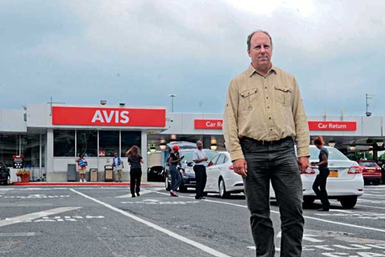 A consistent customer, Richard Schwarz speaks out about car rental companies at the Philadelphia International Airport increasing their prices by eight dollars a day on top of all the other fees there are to rent a car. (VIVIANA PERNOT/Staff Photographer)