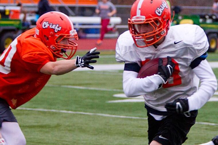 Cherokee's Troy Domenick (right). (David M Warren/Staff Photographer)