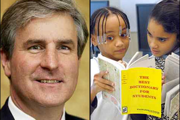 N.J. education commissioner Brett Shundler (left) plans to explore working with Camden officials in turning around the city's troubled public schools. At right, third-grade girls look at their new dictionaries. (April Saul / Staff)