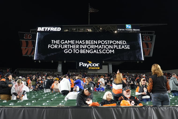 An announcement is displayed on the scoreboard as the game between the Cincinnati Bengals and the Buffalo Bills is postponed following the injury of Damar Hamlin (3) of the Buffalo Bills during the first quarter at Paycor Stadium on Monday, Jan. 2, 2023 in Cincinnati.