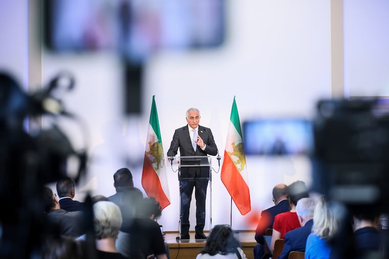 Crown Prince Reza Pahlavi, the son of Iran's toppled Shah Mohammad Reza Pahlavi, speaks during a June press conference in Paris.
