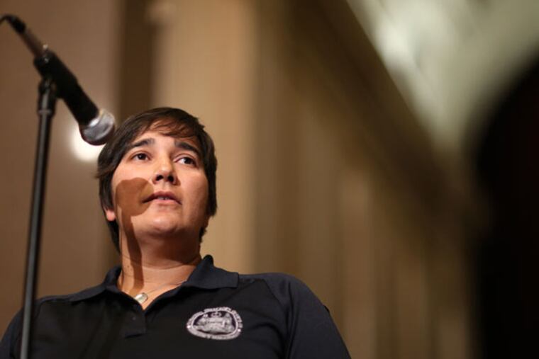 Noelle Foizen, a manager in the city Office of Emergency Management, said that at first, she thought the emergency alert must be a drill. (DAVID MAIALETTI/Staff Photographer)