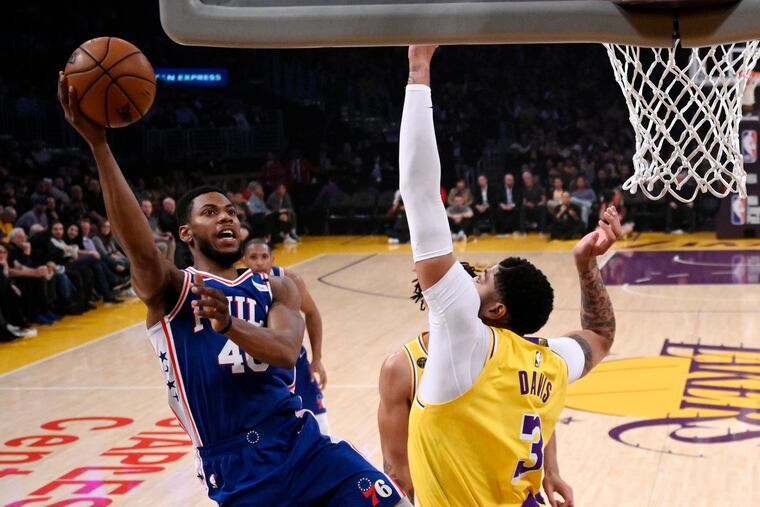 Sixers forward Glenn Robinson III, here shooting over Lakers forward Anthony Davis, had a career-high-tying 25 points on Tuesday.