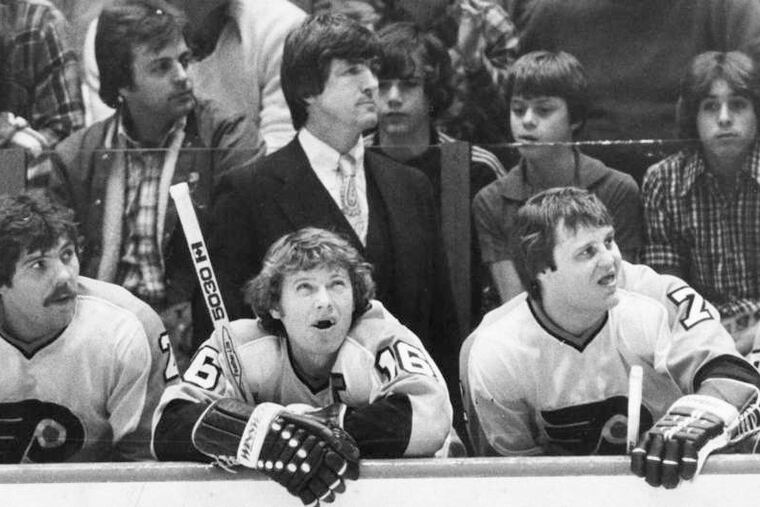 Flyers coach Pat Quinn behind the bench in 1979. Quinn coached the Flyers from 1978-82.