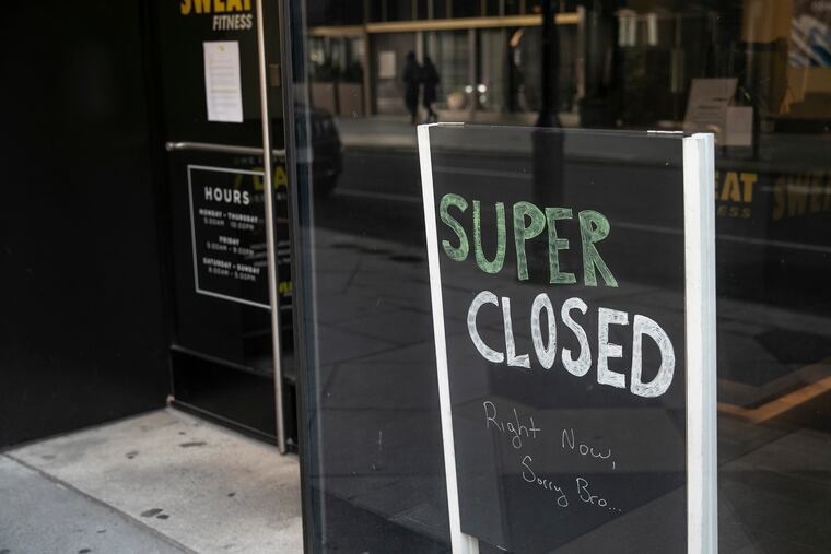 A sign inside Sweat Fitness in Center City in March.