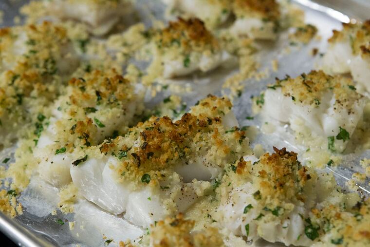 The finished baked cod made by students from Wiggins Prep in Camden, NJ on Nov. 19, 2015. ( CHARLES FOX / Staff Photographer )
