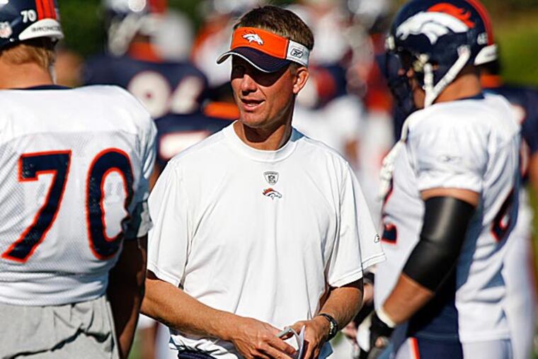 Mike McCoy did nothing to further his candidacy in the Broncos' crushing, 38-35, double-overtime loss to the Ravens. (David Zalubowski/AP file photo)