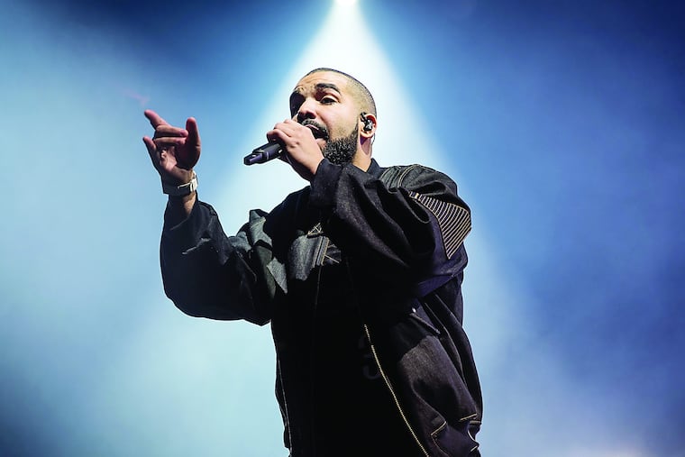 Drake performs during the Summer Sixteen Tour inside the Wells Fargo Arena in Philadelphia on Sunday Aug. 21, 2016.