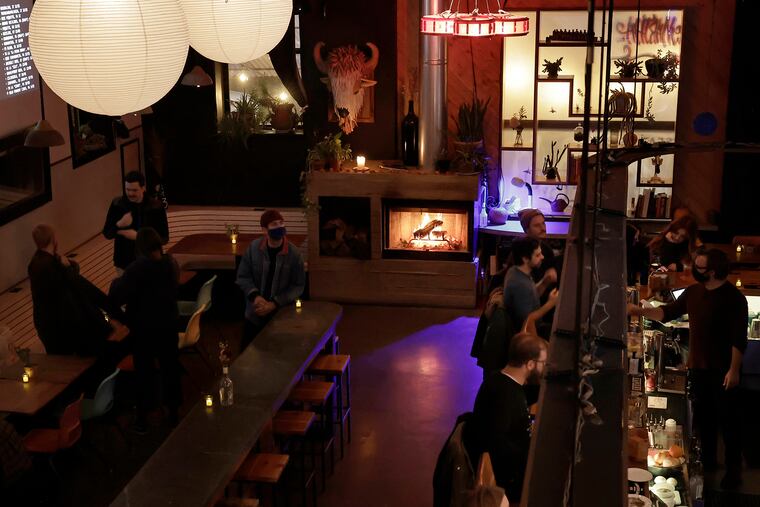 The real wood-burning fireplace in the lounge area at Martha Kensington, 2113 E. York St.