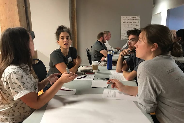 A Kensington Voice meet and greet in October 2018 at Impact Services.The event brought together community partners to talk about ideas for news coverage of the area. Center is Rebecca Fabiano with Fab Youth Philly, who emphasized need for youth involvement, etc.