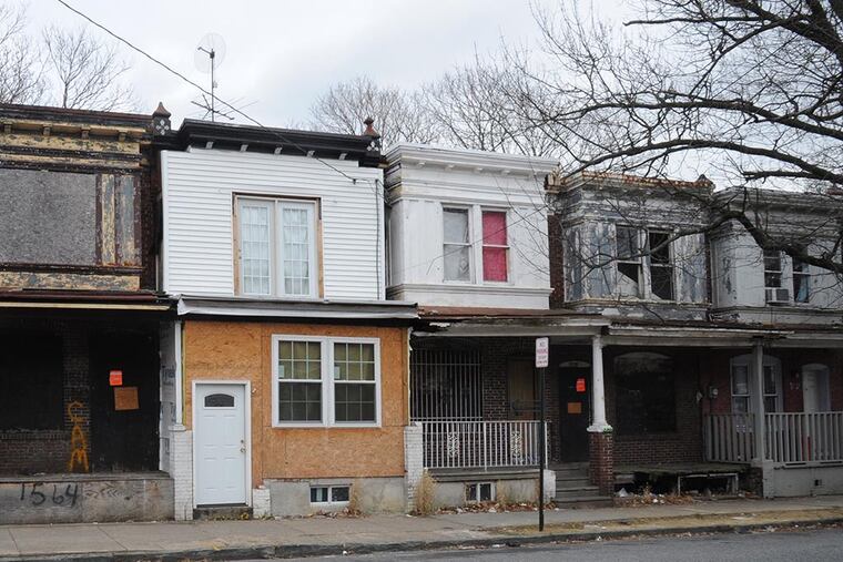 The 1500 block of Louis Street. Camden officials want to raze nearly 600 buildings in the city, an ambitious project that was announced last year but that has stalled because of problems over contracts. ( CLEM MURRAY / Staff Photographer )