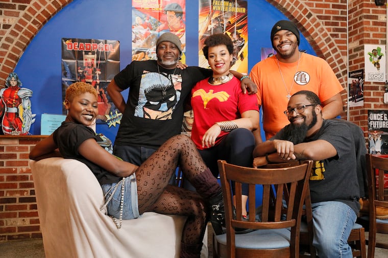 (l-R) Ariell Johnson “Uncanny Tribble,” Len Webb “Bat Tribble,” Kennedy Allen “Storm Tribble,” Isaiah Luck “Super Saiyan Tribble,” and Erik Mack“ Master Tribble” at The Black Tribbles at comic book store Amalgam on Frankford Ave. in Phila. in on Feb. 23, 2020.