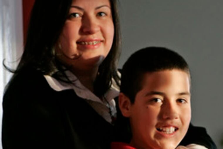Joseph Ramos with his mother, Jocellyn. He denies stealing from a Bucks prosecutor's home.