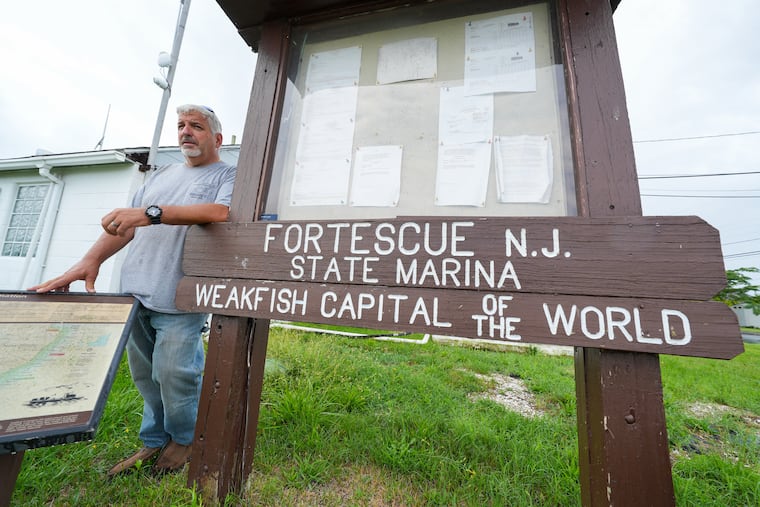Mike Rothman stands by a weakfish sign at the Higbee Marina, Monday, Aug., 3, 2026. Fortescue was once known as the "Weakfish capital of the world," locals are curious where the fish has gone.