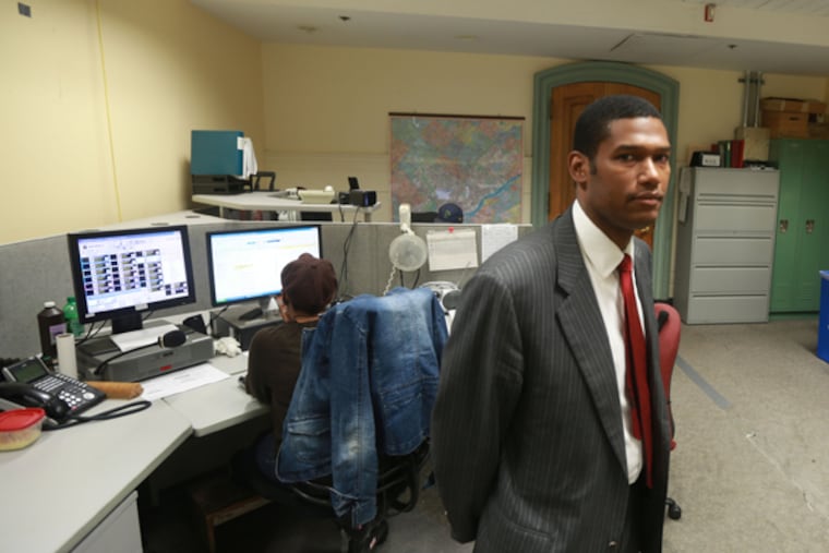 Ray Hayling, Deputy CIO, in the "mysterious" dispatch center on the 7th floor of City Hall September 25, 2014. (DAVID SWANSON/Staff Photographer)