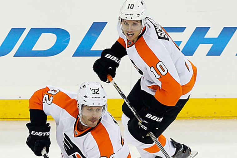 The Flyers' Mark Streit and Brayden Schenn. (Yong Kim/Staff Photographer)