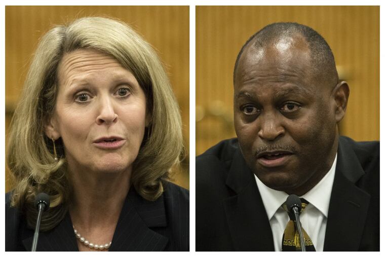 Pennsylvania Supreme Court candidates Republican Sallie Mundy, a justice on the state Supreme Court, left, and Democratic candidate Dwayne Woodruff, a common pleas court judge in Allegheny County take part in a debate at the Widener University Commonwealth Law School in Harrisburg, Pa. (AP Photo/Matt Rourke)