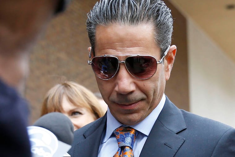 Joey Merlino leaves federal court on Friday, October 10, 2014, after appearing in court on government allegations that he knowingly associated with mobster John Ciancaglini and two othe's with fraud convictions. ( YONG KIM / Staff Photographer )