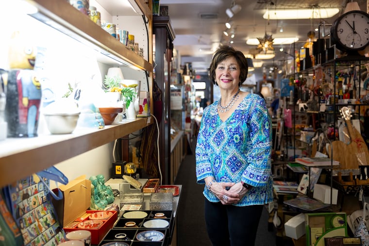 Sherry Tillman, owner of Past Present Future, poses for a portrait in her shop, which will be closing after 50 years. Tillman says she is "gutted" to close, but knows "it's time."