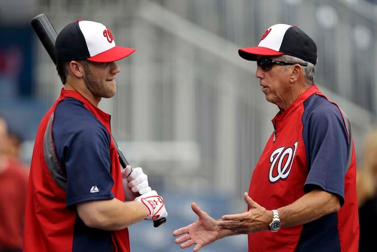 Bryce Harper (left) played for the late manager Davey Johnson as a rookie with the Nationals in 2012.