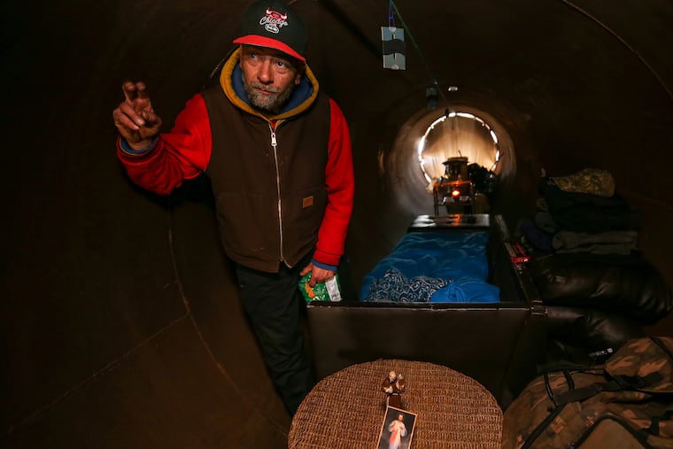 Mike Sojo, 43, of South Philadelphia, who is homeless, talks about living in a construction pipe near the Walt Whitman Bridge.
